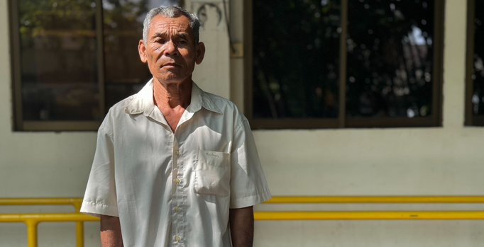 Image of Khorn, a 65-year-old rice farmer from Cambodia.
