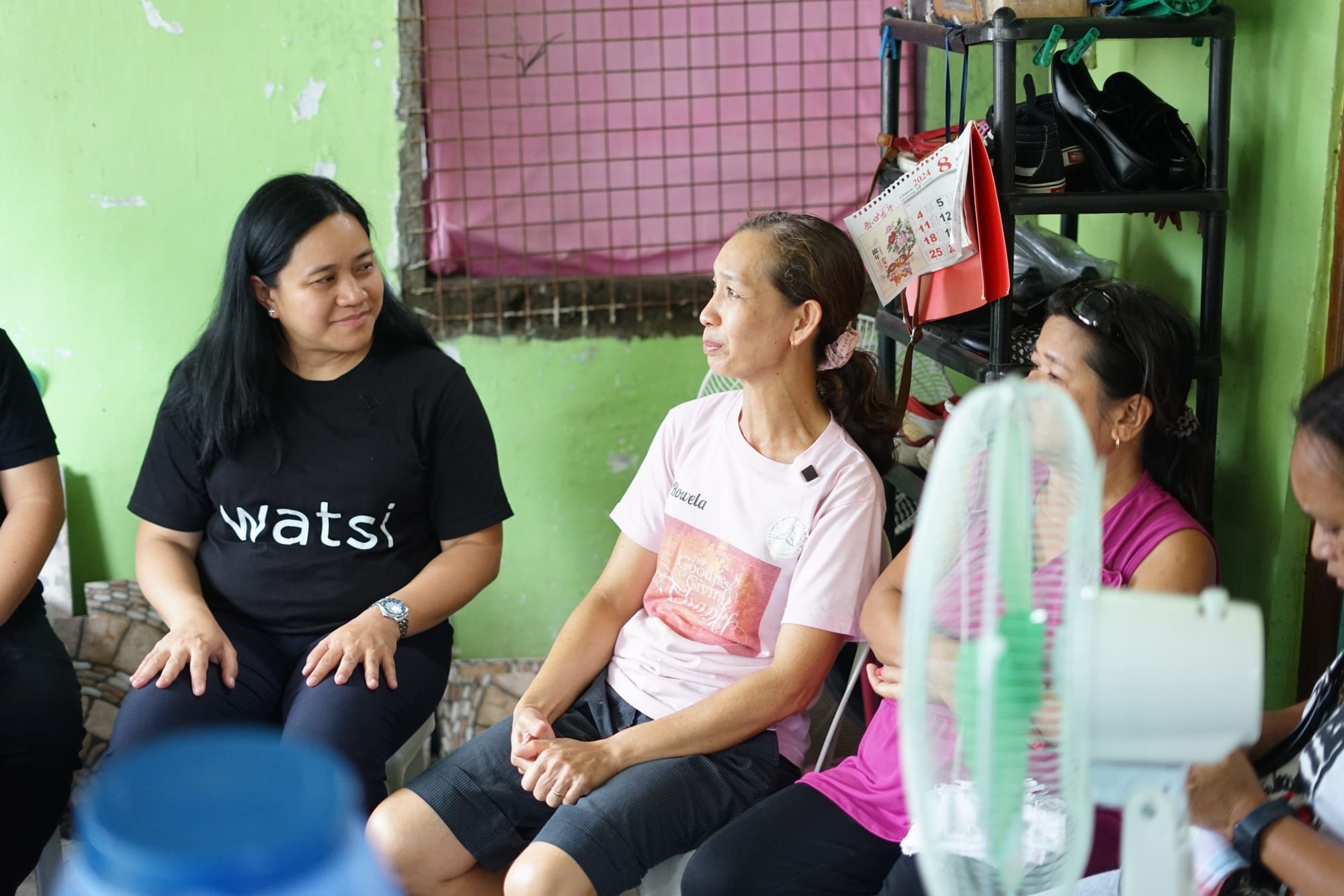 A photo of Kimmy with Rowela at her home in the Philippines