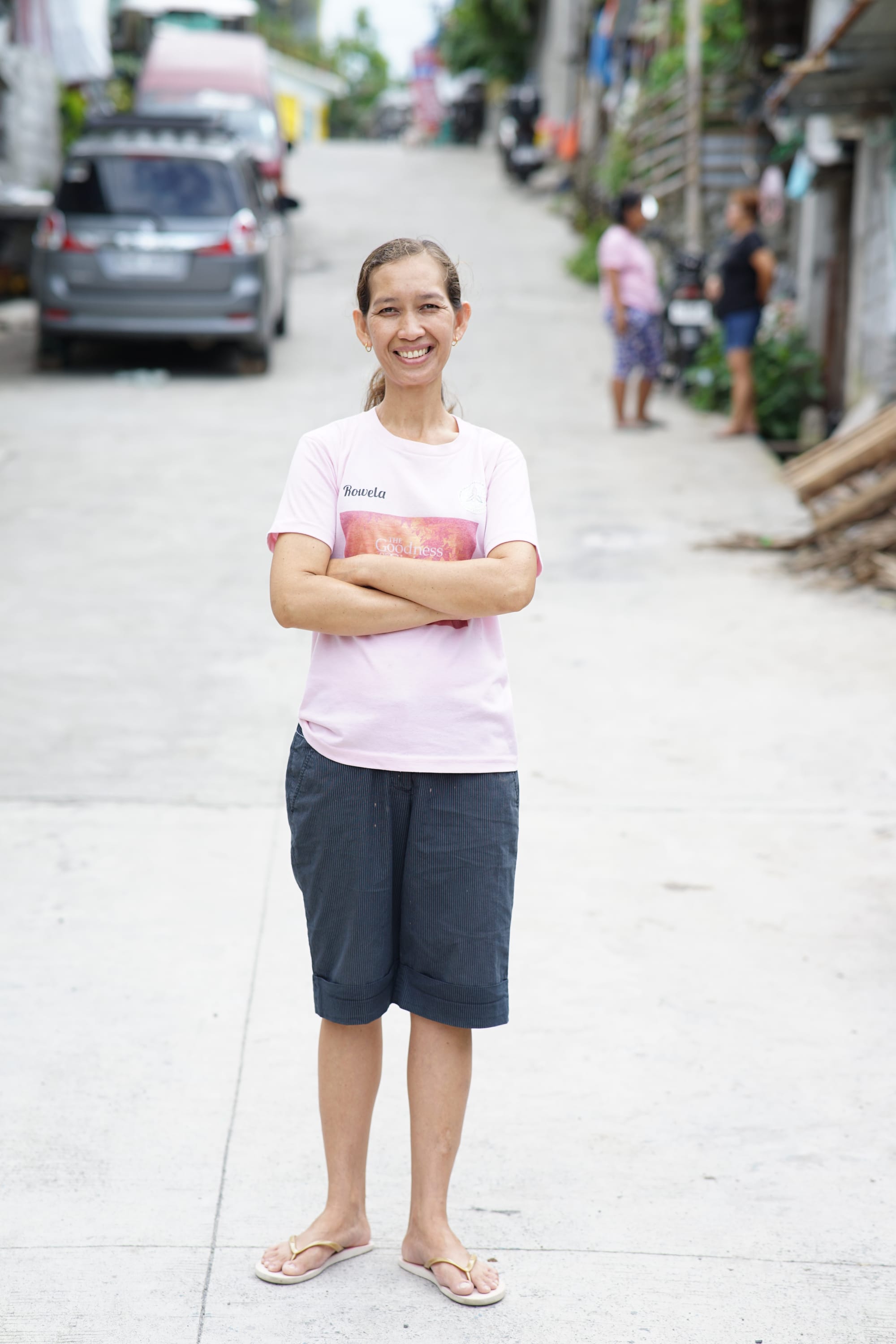 A photo of Rowela sharing a smile and feeling strong after her breast cancer surgery 